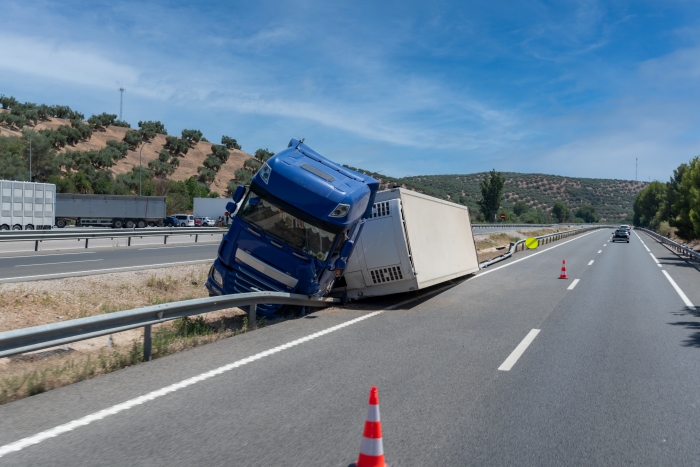 Truck with an accident refrigerated semi-trailer