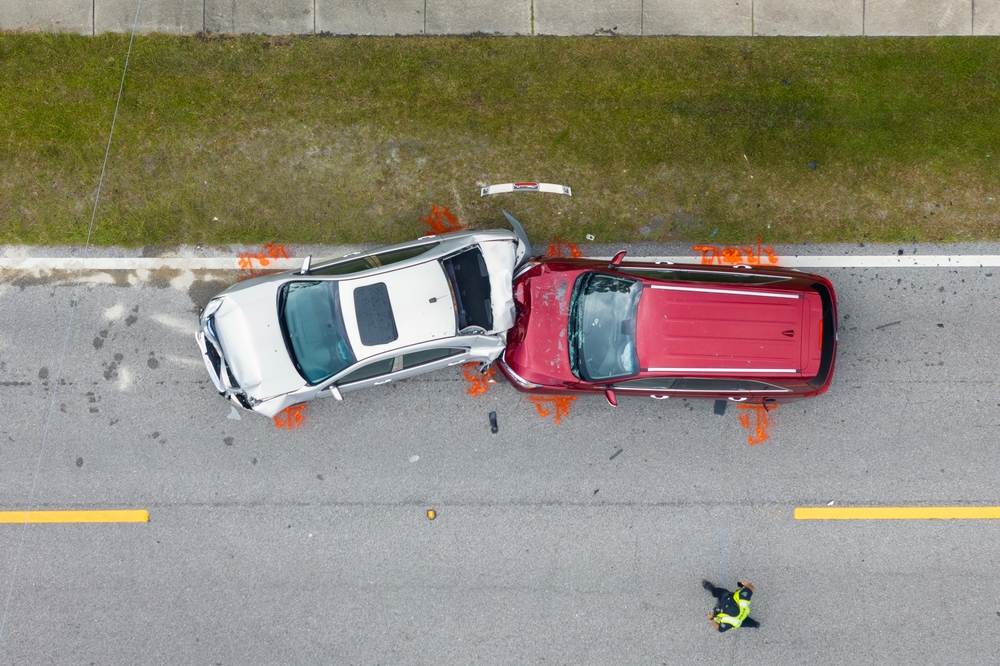 Aerial view of a car accident on a high-risk Columbus, MS road