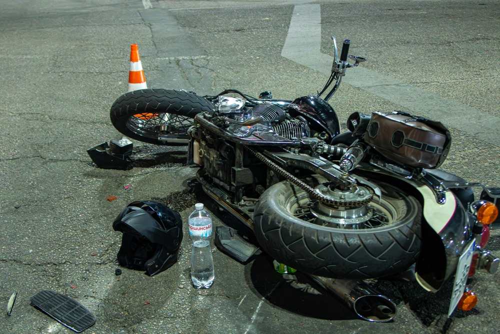 Overturned motorcycle and helmet at a Mississippi crash scene