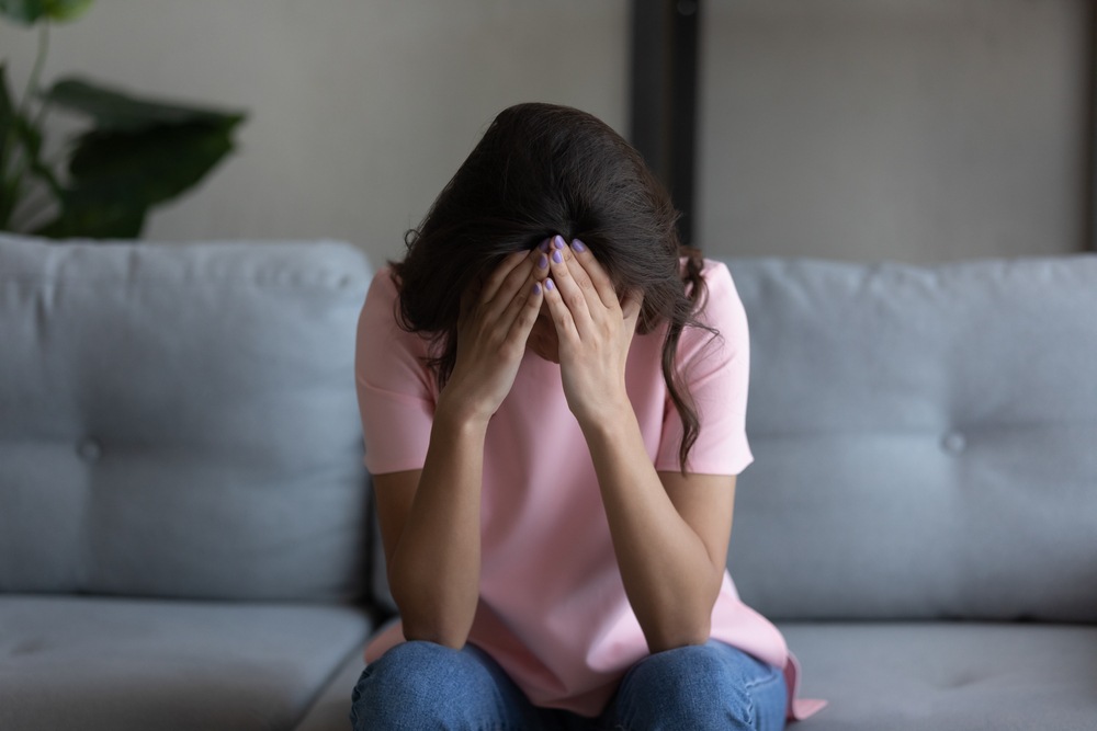 Grieving woman coping with loss after a wrongful death in Mississippi